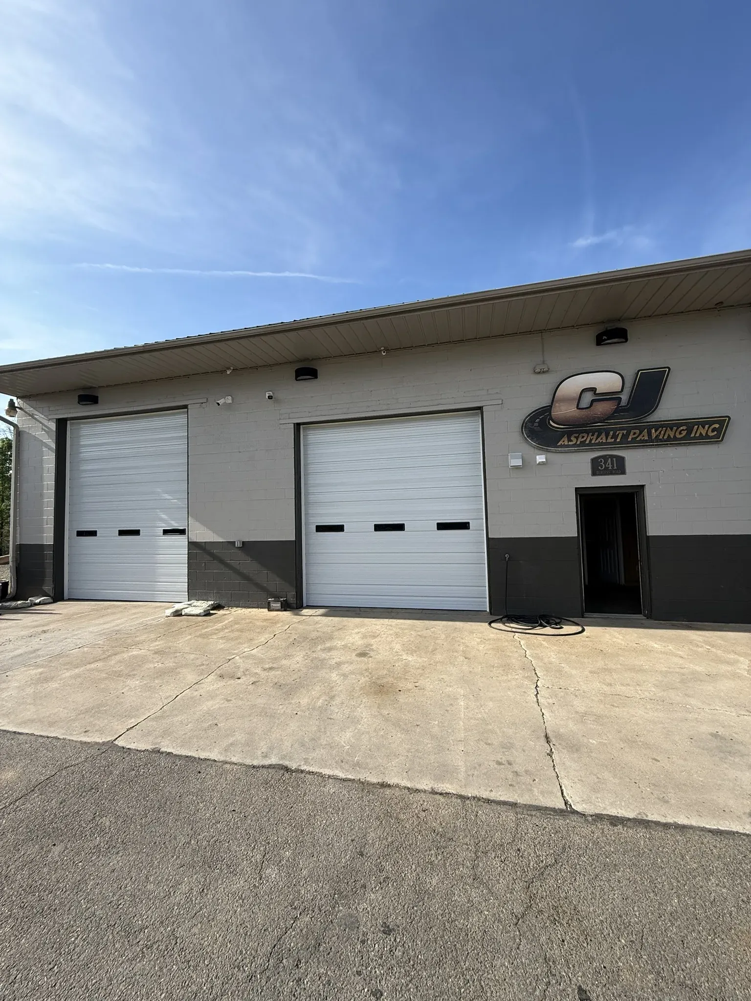 Dual commercial doors on industrial building